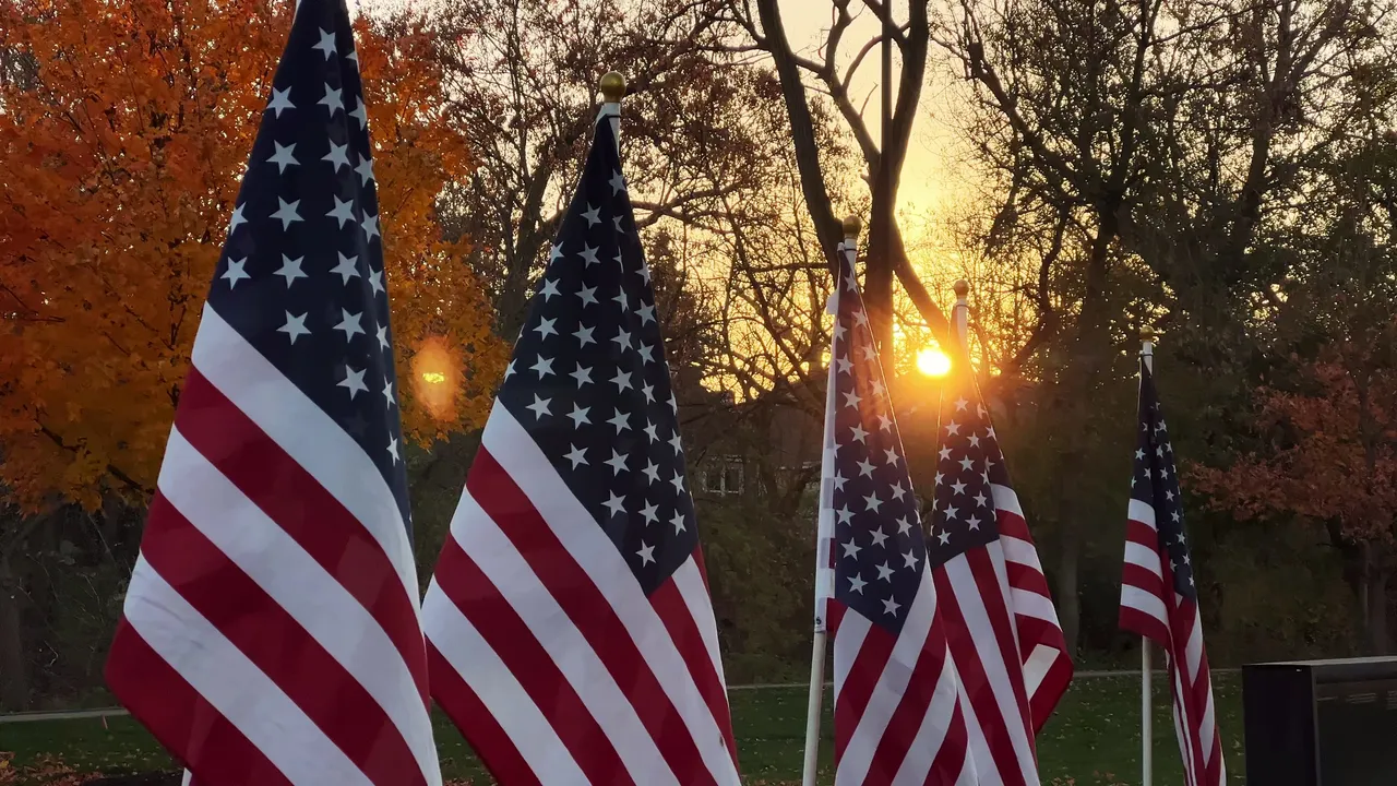 American flags at sunset
